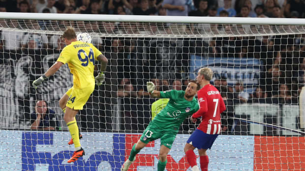 Lazio goalkeeper Ivan Provedel pictured heading the ball to score a goal against Atletico Madrid in September 2023